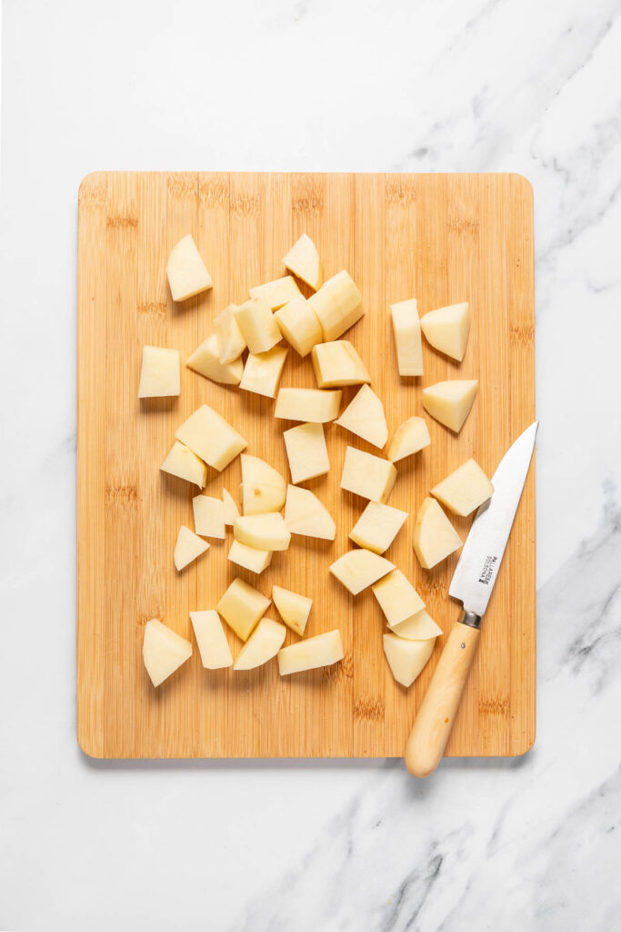 russet potato chopped on a cutting board