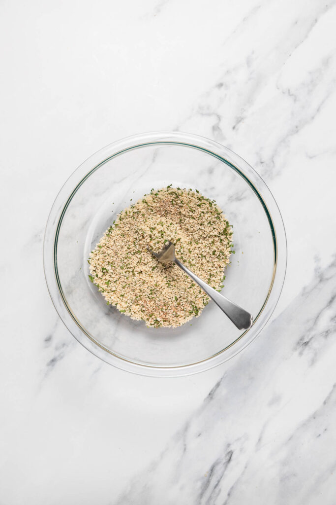 dry ingredients of tuna potato patties on a small bowl